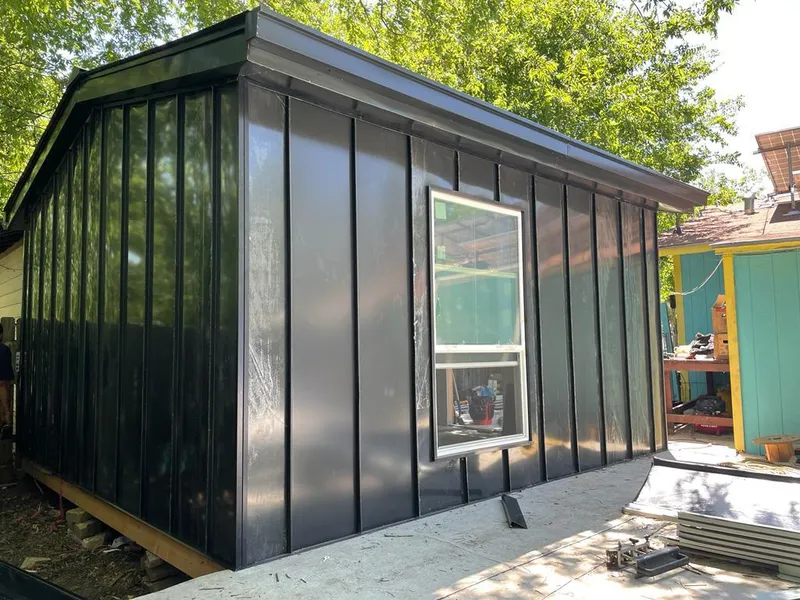 Black standing seam metal wall panels for Roof Inspection in Middlesborough