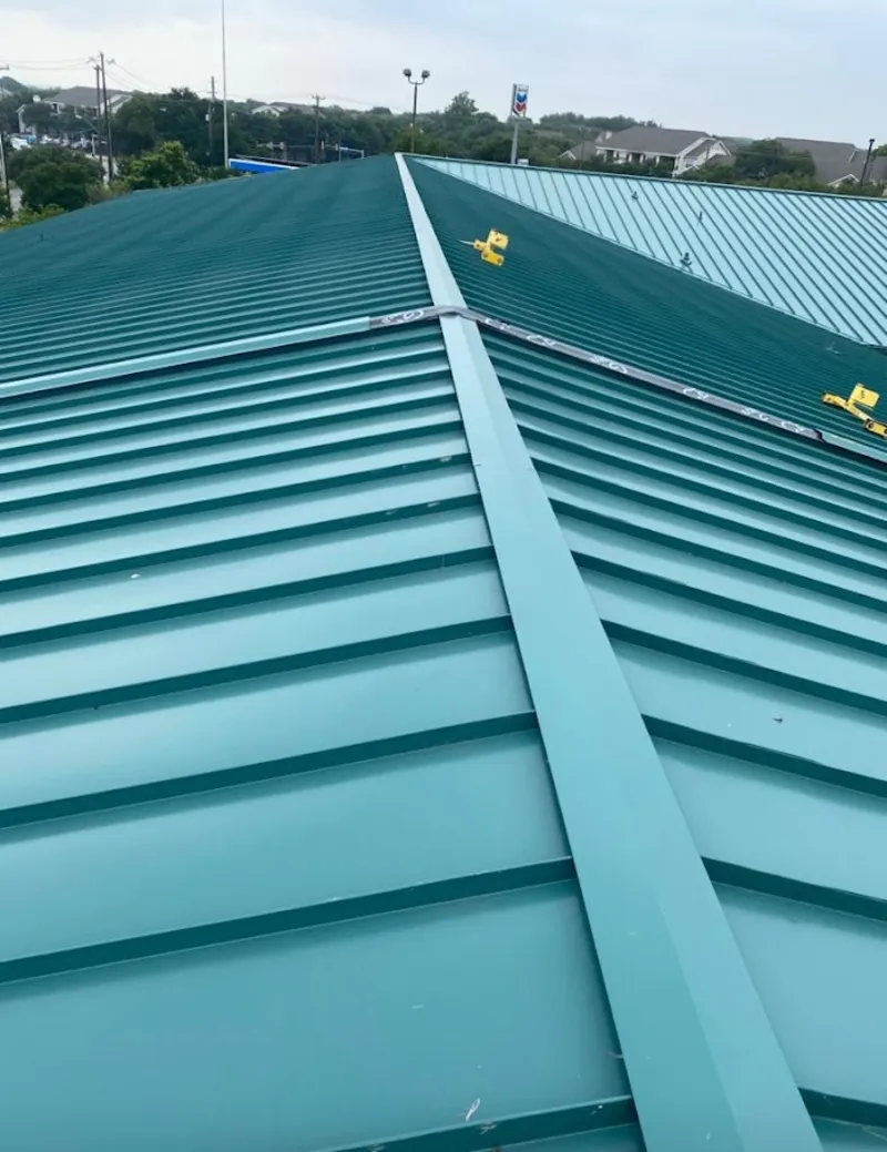 Green commercial metal roof ridge and valley for Metal Roof Repair in Middlesborough
